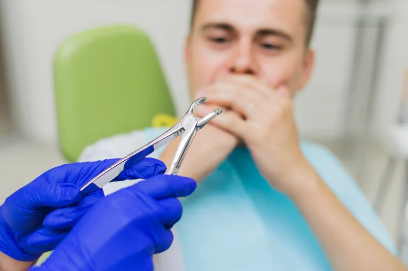 Tooth removal procedure before immediate dental implant placement for missing tooth replacement